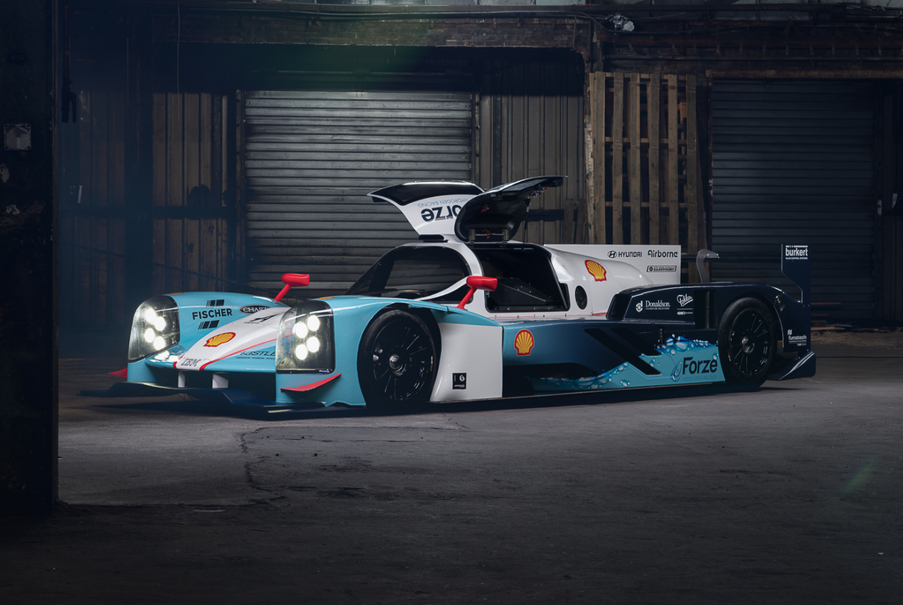 The Forze 9 with the doors open, in a construction hall.